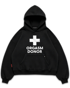 Los Surenos Orgasm Donor siyah hoodie ön görünüm, oversize boxy fit kapüşonlu sweatshirt, minimal tipografi ve artı sembol baskılı cesur streetwear tasarım #siyah